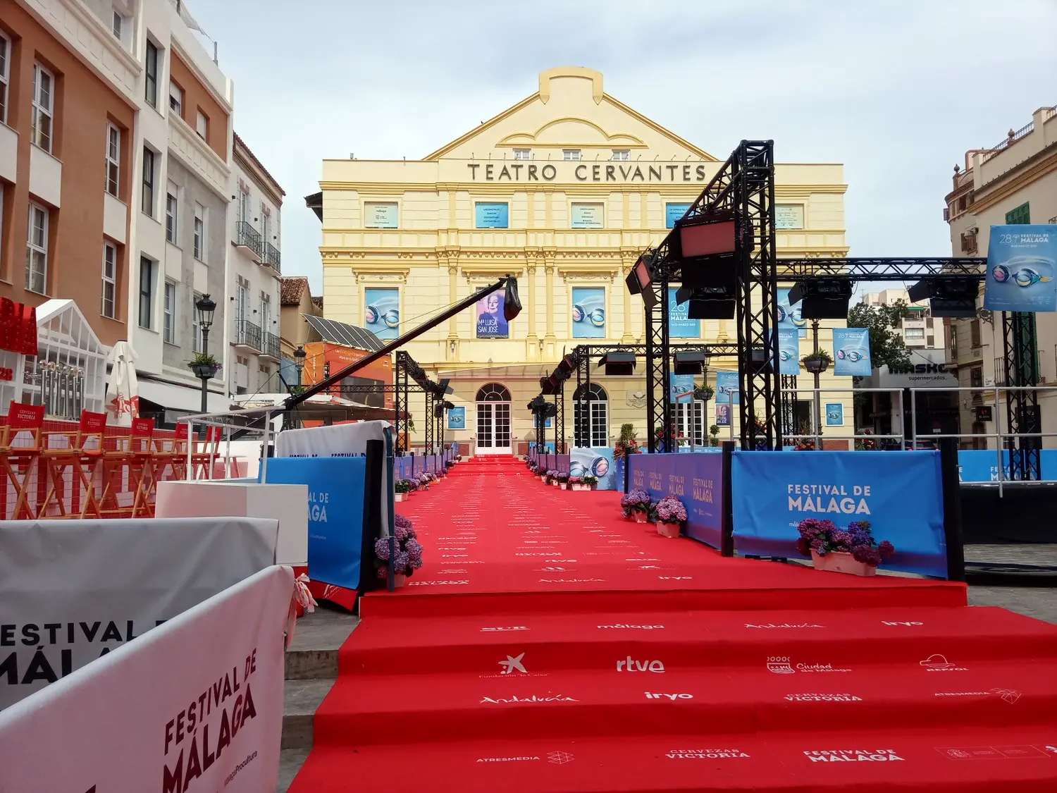 Red carpet and festival banners in front of Teatro Cervantes during the Málaga Film Festival