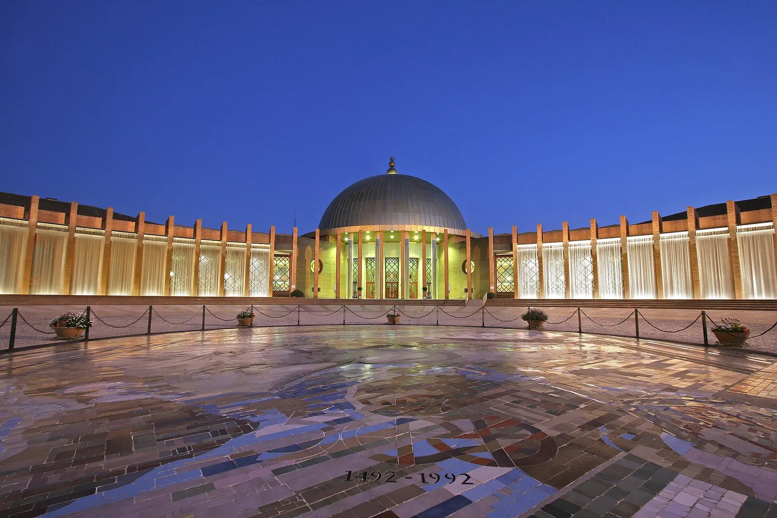 Outdoor plaza and dome of the FIBES exhibition and congress centre in Seville at dusk