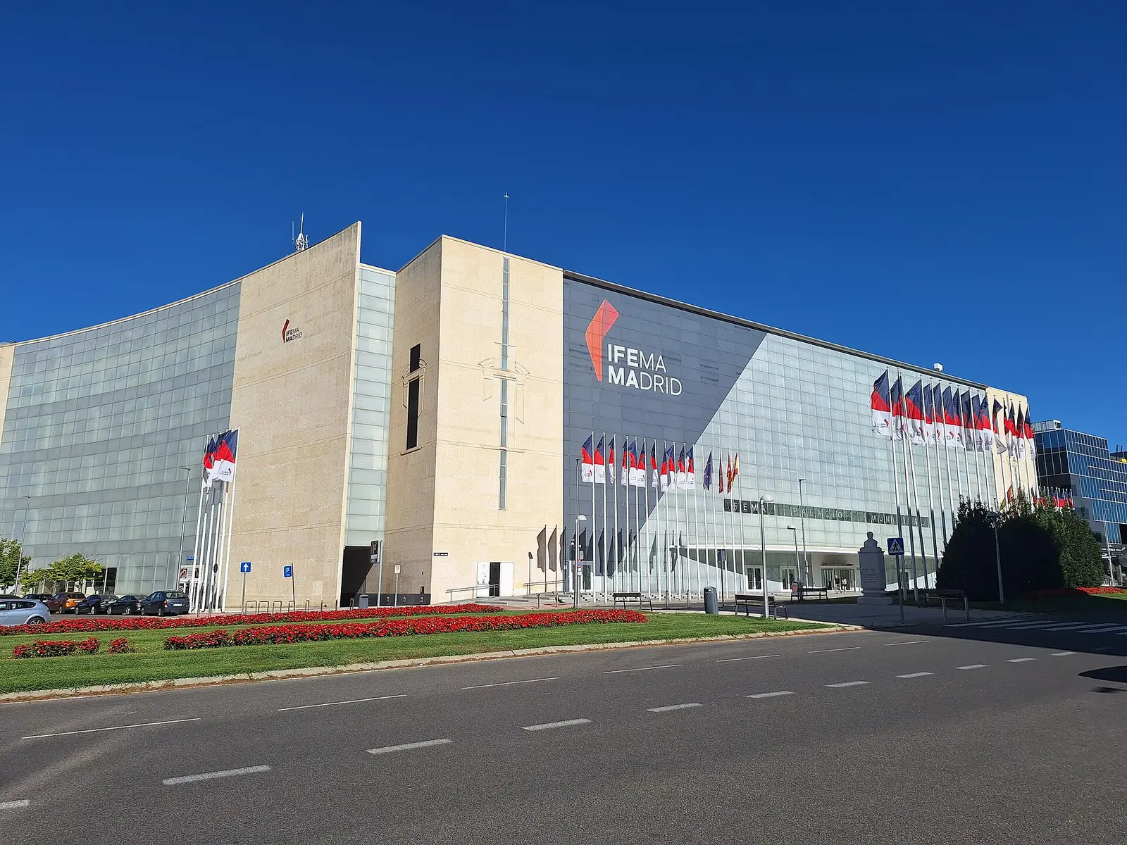 Exterior of the IFEMA Madrid exhibition centre under a blue sky