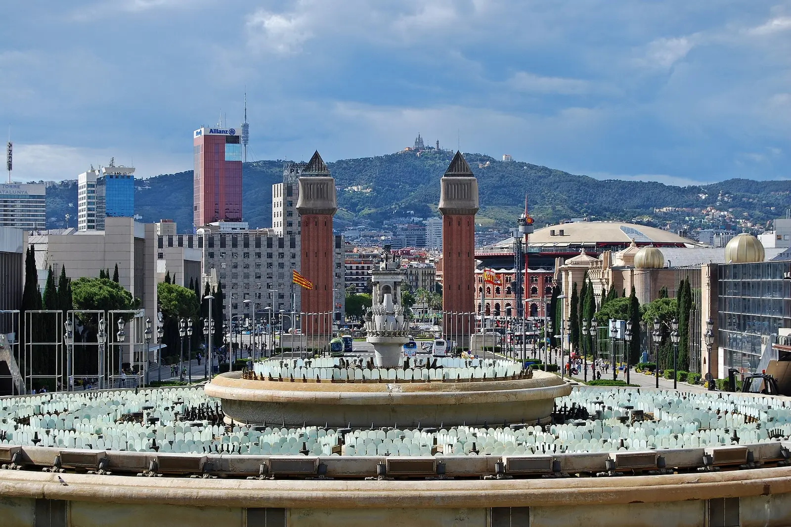 Fountains and Venetian towers on Avinguda de la Reina Maria Cristina towards Montjuic