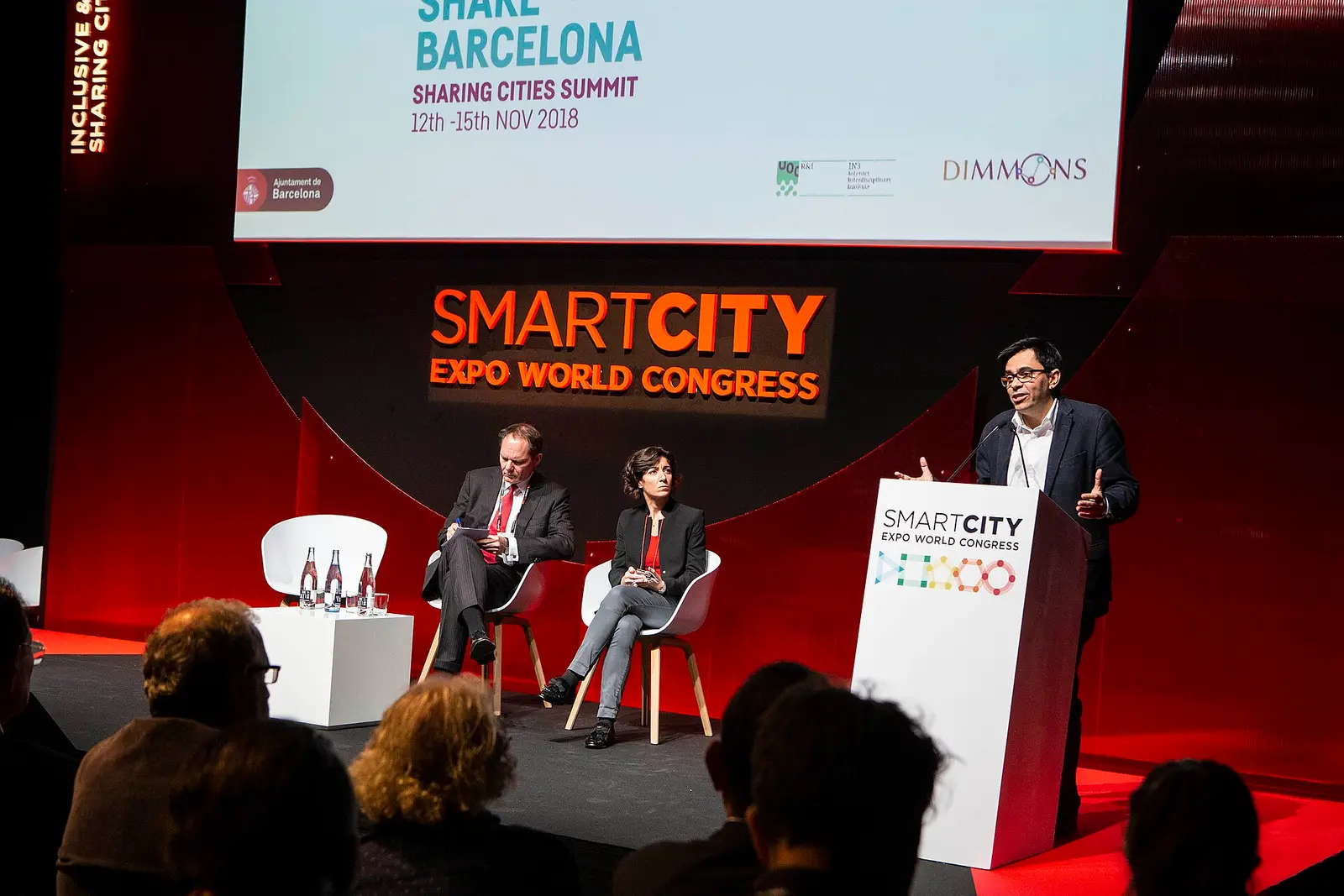 Panel on stage at the Smart City Expo World Congress in Barcelona with the event backdrop